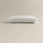 بيت مخدة قطن ٢ قطعة لون أوف وايت