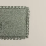 دعاسة حمام بعدة مقاسات باللون الأخضر الغامق