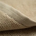 منشفة قطن لون بيج غامق بعده مقاسات